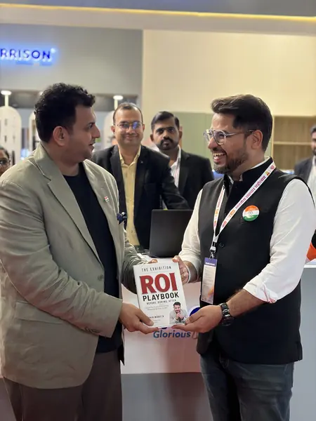 Reader with The Exhibition ROI Playbook 6