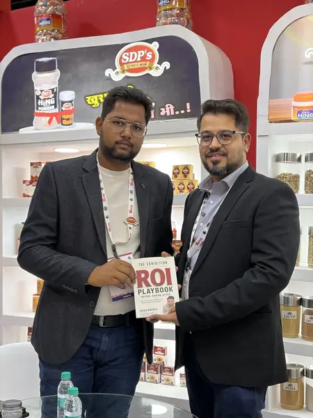 Reader with The Exhibition ROI Playbook 9