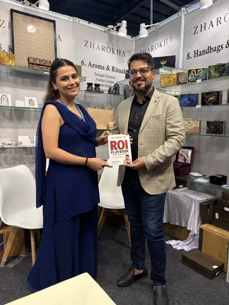 Reader with The Exhibition ROI Playbook 13